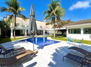 Casa · 657m² · 6 Quartos · 6 Vagas · Rara Oportunidade no Jardim Acapulco: Casa Moderna com 1.000m² de Terreno e 6 Suítes
