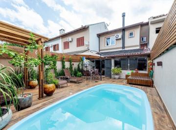 Casa · 115m² · 3 Quartos · 2 Vagas · Casa com 150m², 3 dormitórios, 1 suíte e pátio com piscina - Lagos de Nova Ipanema