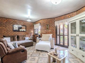 Casa · 174m² · 3 Quartos · 3 Vagas · Casa à Venda no Bairro Santa Fé - 175m² Privativos, 3 Dormitórios, Suíte e Amplo Pátio