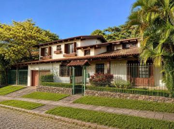 5984_iPV9I8128_59846a01ce41158fe.jpg · Casa ampla com elevador e piscina no Jardim Isabel