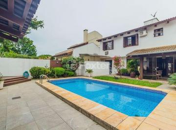 Casa de 5 quartos, Porto Alegre · Viva entre a conveniência do Zaffari e o lazer da Orla: Casa com 5 dormitórios em Ipanema!
