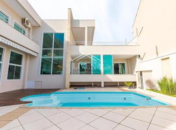1 · Casa com 405 m², 4 suítes e piscina em rua tranquila no São Braz