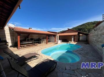 Foto 01 · Casa com edicula a venda em Ubatuba na Praia da Maranduba. Area gourmet com piscina aquecida. 600mts