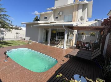64199e0cdd051cb58c945624ace49c6bc1c6d3f7 · Casa em Condomínio Fechado com Piscina à venda em Palhoça.
