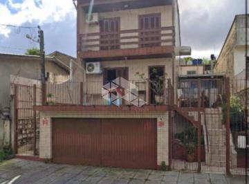 WhatsApp Image 2026-03-09 at 14.57 · 3 casas semi mobiliadas com garagem no bairro Santa Tereza
