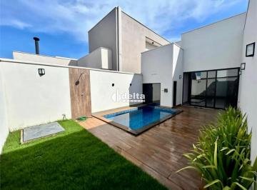 Casa · 360m² · 4 Quartos · 4 Vagas · Casa em condomínio com 4 suítes disponível para locação no bairro Novo Mundo em Uberlândia-MG