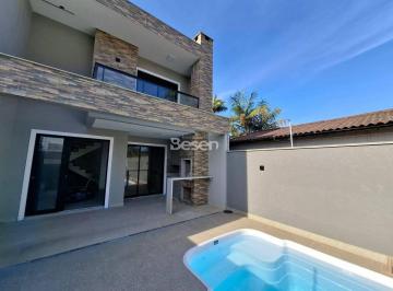 Casa · 146m² · 4 Quartos · 2 Vagas · SOBRADO A 300 METROS DO MAR, COM PRIVACIDADE, CONFORTO E BOM ACABAMENTO