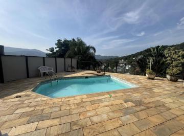 Casa · 440m² · 4 Quartos · 2 Vagas · Casa Rústica no condomínio UBÁ FLORESTA - 4 quartos