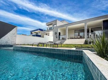 je5iov42owywyzi0yjmymwfj_md · Casa Linear de Alto Padrão 4 quartos  3 suítes – no Arquipélago de Manguinhos