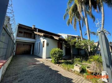 213a6c2aea0c9b2b4063db01565632ca007ad857 · Casa com 4 dormitórios para alugar, 330 m² por R$ 7.563,35/mês - Camaquã - Porto Alegre/RS
