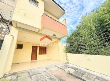 Casa · 148m² · 3 Quartos · 3 Vagas · Casa em Rua Itacyr Rossi - Guarujá - Porto Alegre/RS