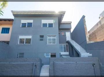 fundo · Casa para alugar no bairro Medianeira | 3 dormitórios | Pátio amplo | Espaço gourmet | 298m² | Porto