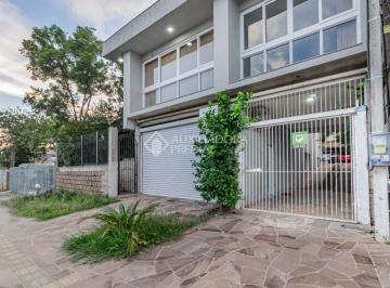 01 · Sobrado de 3 dormitórios, sendo uma suíte, espaço comercial e anexo nos fundos