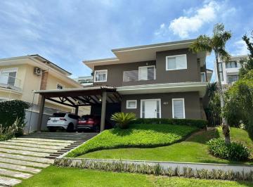 34120b67-16f1-4ae9-a0ed-fa5cf097d13a · Casa no condomínio Golf Village para venda com 4 quartos, sendo 4 suítes, 328m²