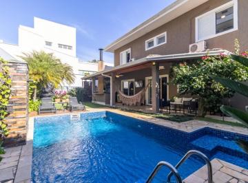 6939845f-dec0-4708-99c5-1937a1a6f12f · Casa no condomínio Golf Village para venda com 4 quartos, sendo 4 suítes, 328m²