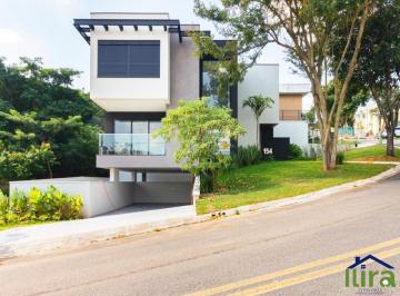 v4392a.jpg · Casa para venda com 4 suítes, 4 vagas de garagem e piscina no condomínio New Ville, Santana de Parna