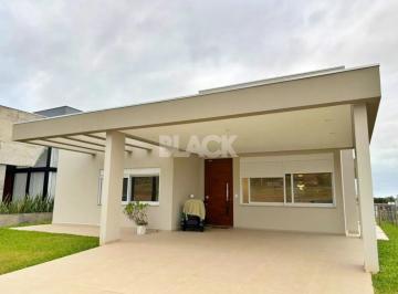 Casa · 248m² · 3 Quartos · 2 Vagas · Casa térrea mobiliada no Condomínio Reserva das Águas em Torres RS