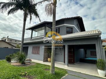 Casa · 222m² · 4 Quartos · 2 Vagas · Sobrado à venda no bairro Tiroleza - Tramandaí/RS