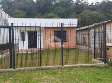 Fachada · Casa à venda na avenida Juca Batista no bairro Belém Novo em Porto Alegre / RS.