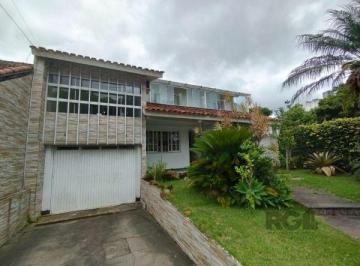 Casa · 340m² · 6 Quartos · 3 Vagas · Casa em Porto Alegre, no bairro Ipanema, com 6 dormitório(s), e 6 banheiros, à venda.
