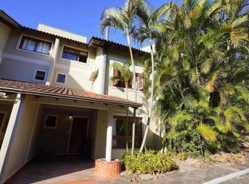 Casa de 3 quartos, Porto Alegre · Casa em Condomínio com 3 Dormitórios (1 Suíte), Sótão Versátil e Pátio no Bairro