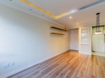 Excelente apartamento semimobiliado com 64 metros privativos, living com janelas · Apartamento com 2 suites, lavabo e 2 vagas de garagem no Bairro Rio Branco