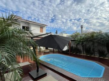 Casa · 220m² · 3 Quartos · 3 Vagas · Casa com Piscina Aquecida e Energia Solar