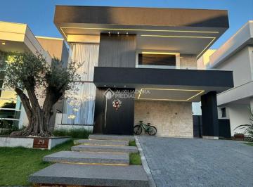 Casa · 220m² · 3 Quartos · 2 Vagas · Viver bem é uma arte, e este sobrado no Alphaville Gravataí é a obra-prima que você procurava.