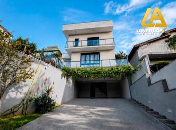 aabeb9a95c1c2e0ffffd7bdd95c7ca31fb2e34de · Casa alto padrão com 418m², 5 suítes, piscina aquecida e 9 vagas