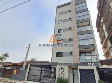Foto 01 · ALUGUEL Anual  de apartamento com 2 suítes no Centro de Navegantes-SC