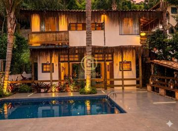 Foto 01 · Pousada à Venda em Ilhabela-SP: Casa Comercial com 10 Quartos, Piscina e Vista para o Mar! Oportunid