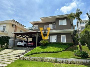 Casa · 328m² · 4 Quartos · 4 Vagas · Casa no condomínio Golf Village para venda com 4 quartos, sendo 4 suítes, 328m²