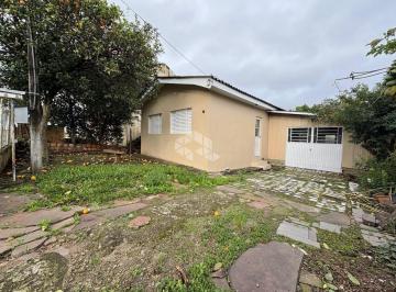 Casa · 98m² · 3 Quartos · 1 Vaga · Casa 3 dormitórios com pátio no Bairro Urlândia