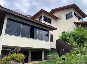 Casa · 165m² · 3 Quartos · 4 Vagas · Casa Alto Padrão no Cacupé com 3 Quartos, Hidromassagem Externa e Amplo Terreno de 600m²
