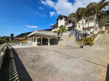 parn8pw2owziotg5otyzngiz_md · Casarão de 478m² com 4 suítes master + aptos de hóspedes e lazer