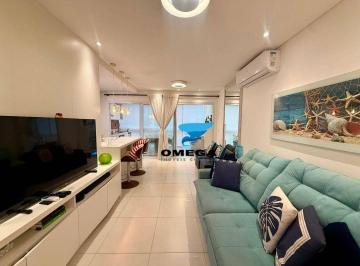 85e8a3d807fd76584222add44ddd1b12dee2d1a2 · Apartamento novo à venda na praia do Tombo no Guarujá I Omega Imoveis