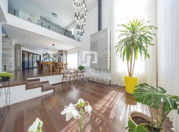 1 · Casa de condomínio com 301.94 m², 4 quartos sendo 3 suítes à venda no bairro Santa Cândida.