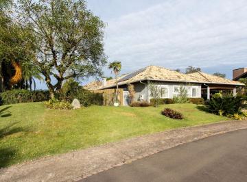 Photo 1 · Casa térrea/2.371m2 de terreno no Condomínio Terra Ville, com fundo para o lago.