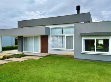 Casa · 206m² · 4 Quartos · 2 Vagas · Casa térrea 4 suítes, semi mobiliada no condomínio fechado Lagoa do Passo em Atl
