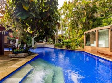 12852-20260521142334_zap.jpg · Casa espetacular na Barra muito verde e paisagismo assinado por Burle Marx.
