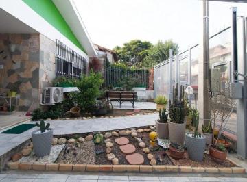 Casa · 248m² · 4 Quartos · 2 Vagas · Casa com 4 dormitórios e energia solar no bairro Nonoai.