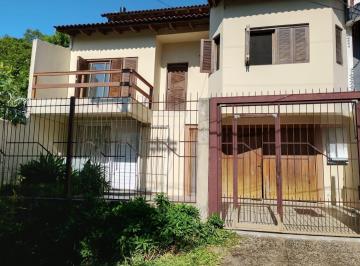 Casa · 287m² · 3 Quartos · 4 Vagas · Casa com 3 quartos, 4 vagas de garagem e com pátio no bairro Parque Santa Fé
