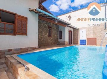 Casa · 209m² · 3 Quartos · 2 Vagas · Casa à Venda no Itapoã BH: 3 Quartos, Suíte, Piscina Aquecida, Sauna e Espaço Gourmet
