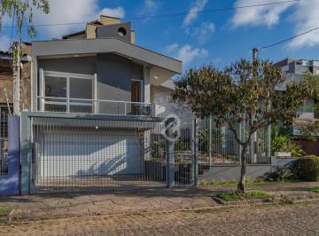 657b5336aaeca0298219a282824d01632c74bd79 · Casa com 3 dormitórios à venda, 223 m² por R$ 1.690.000 - Jardim Lindóia - Porto Alegre/RS