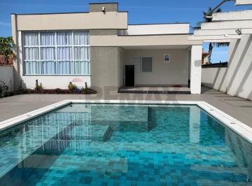 Casa · 222m² · 4 Quartos · 8 Vagas · Seu Refúgio dos Sonhos no Morada da Praia!