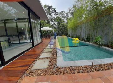 e33bc33030fe53d720c62416e570b325042b4e47 · Casa com 5 dormitórios para alugar, 260 m² por R$ 3.300,00/dia - Riviera - Módulo 24 - Bertioga/SP