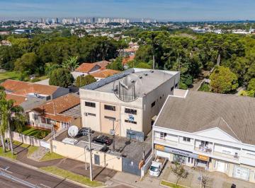 tglp6ro2ytbjnzy0otqxztaw_md · Imóvel comercial com ampla testada e excelente visibilidade na Av. Manoel Ribas