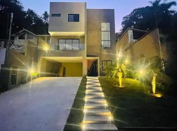 Casa · 221m² · 3 Quartos · 4 Vagas · Casa para venda em Transurb de 221.05m² com 3 Quartos, 3 Suites e 4 Garagens