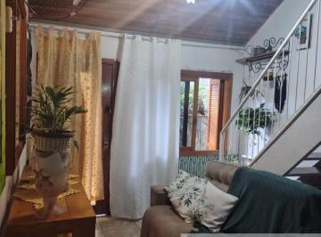 Foto 01 · Casa à venda em Porto Alegre-RS, bairro Costa E Silva: 3 quartos, 1 suíte, 1 sala, 2 banheiros, 2 va