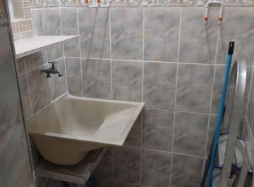 Lavanderia · Venda de um apartamento